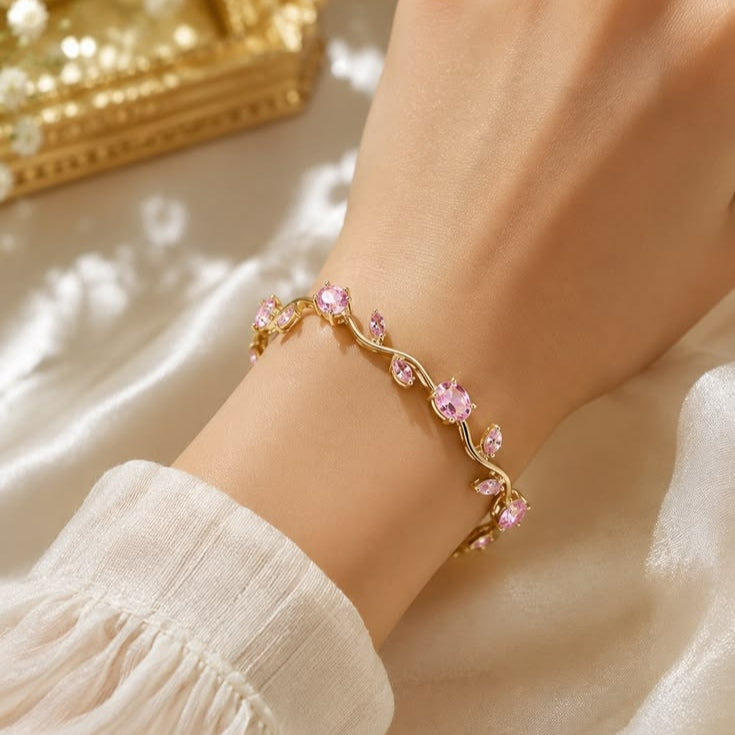Pink Crystal Wave Bracelet – Elegant Gold-Tone Jewelry